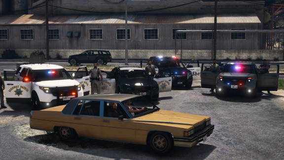1 Yellow Emperor and 4 cop cars