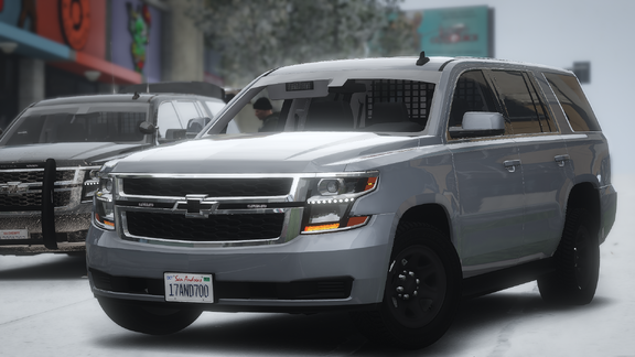 Grey Tahoe in a Grey City