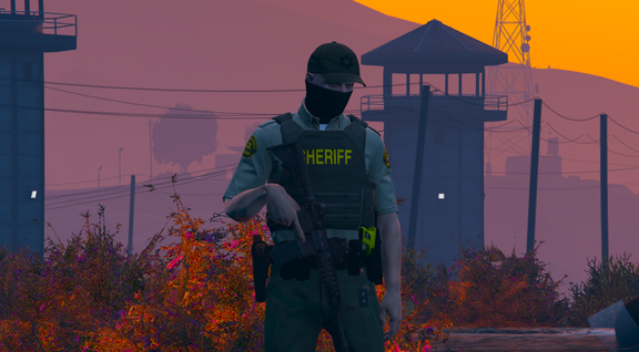 Deputy sheriff on the background of sunset